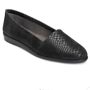 Black leather flats with snake pattern embossed